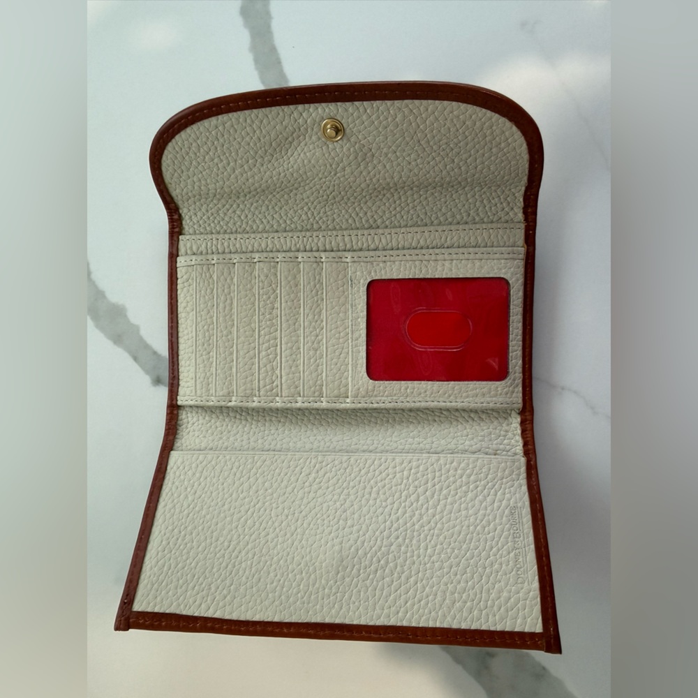 Dooney & Bourke Cream Pebble Leather Wallet with Brown Trim and Brass Plaque - Picture 3 of 8